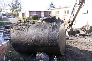 Removal of above and underground storage tanks on Contaminated land